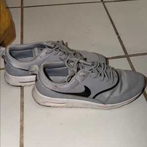 Gray Athletic Sneakers with Black Swoosh